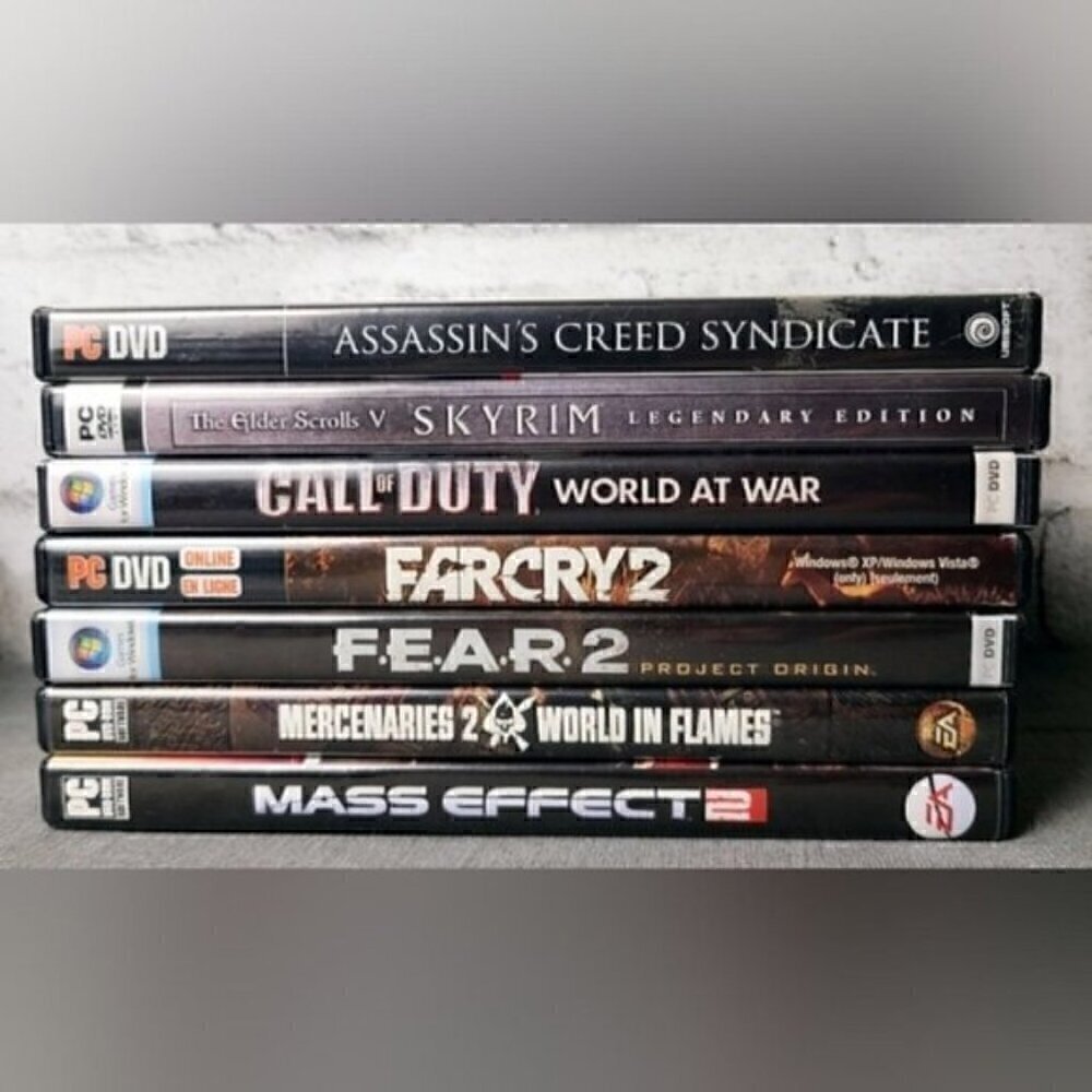 7 Mixed PC Games, Skyrim, Assassin's Creed, Call of Duty, Far cry, FEAR, +2 More